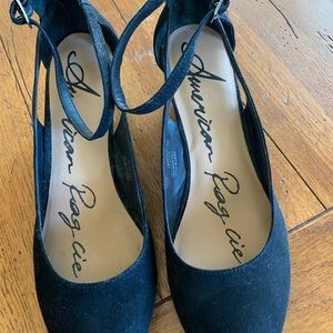 Black suede wedge shoes